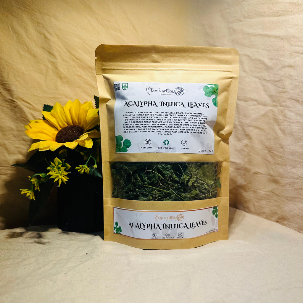 Two packages of Acalypha Indica Leaves with a sunflower on a textured surface
